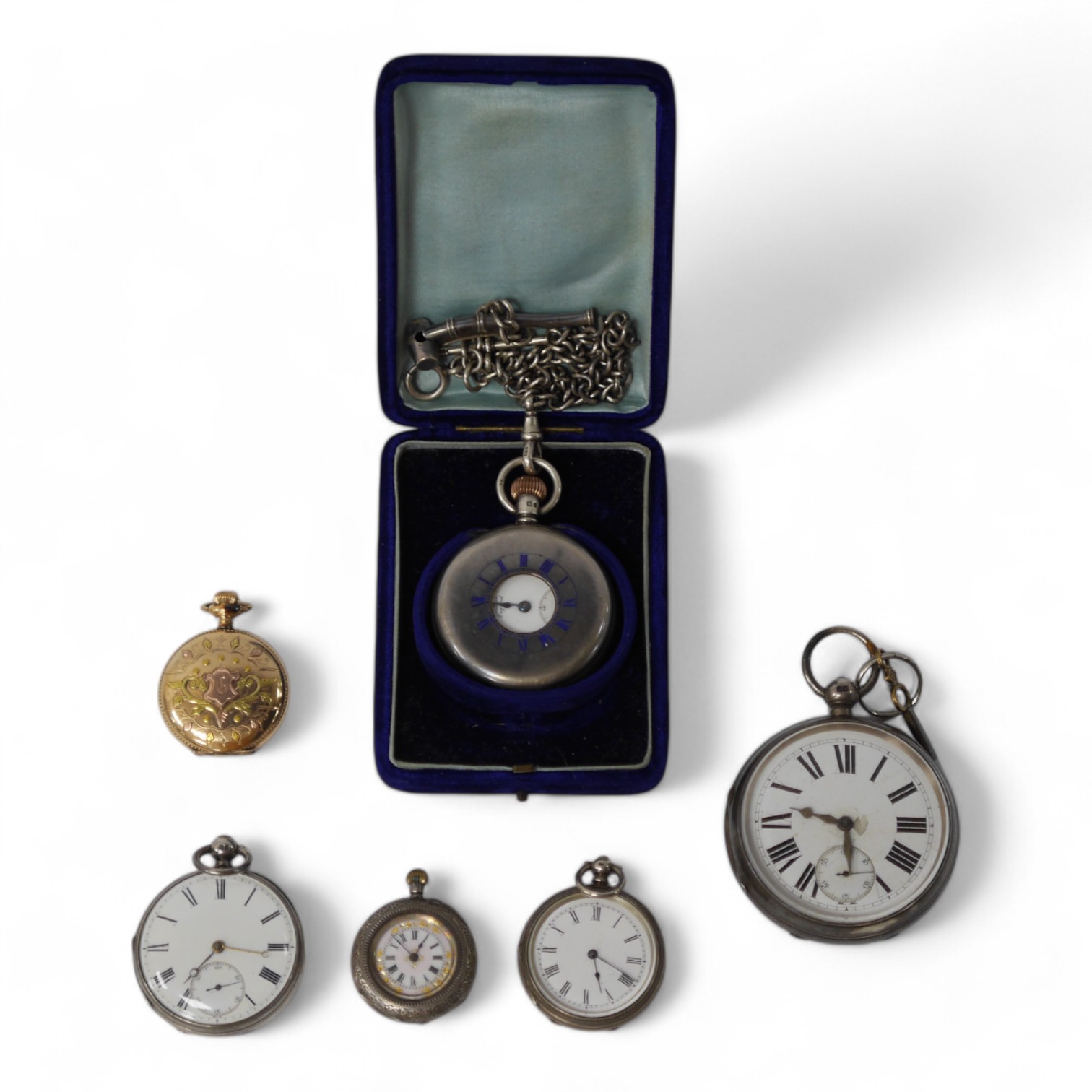 Six assorted pocket and fob watches, including a Victorian silver open faced, case diameter 62mm, a silver half hunter pocket watch with a silver albert and a small plated bosun's call. Condition - poor to fair to good